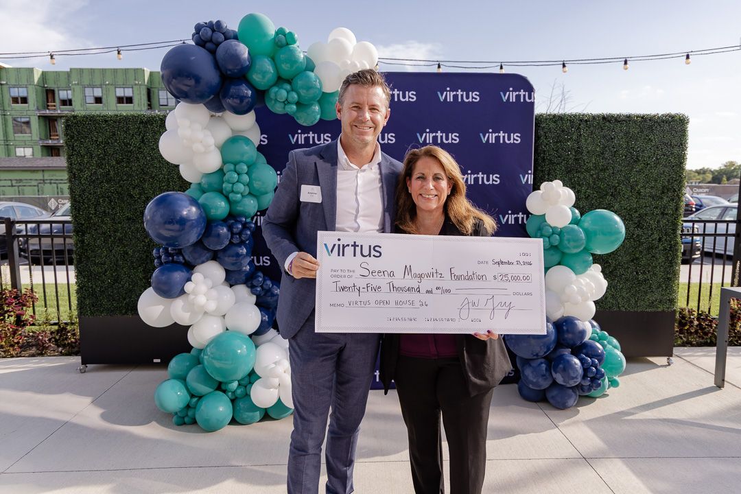 A presentation check for the Seena Magowitz Foundation at Virtus Days.